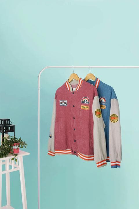 Foto model menggunakan produk Jade Suede Varsity Jacket