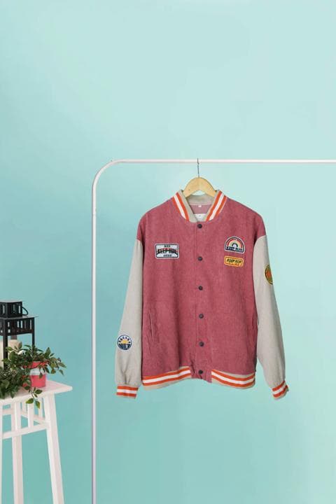 Foto model menggunakan produk Jade Suede Varsity Jacket