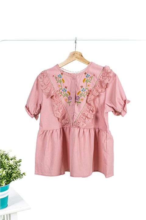 Foto model menggunakan produk Febe Lace Peplum Blouse