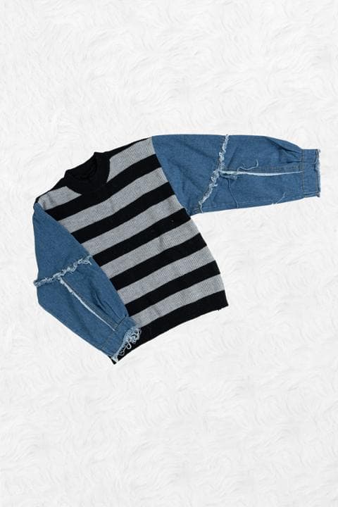Foto model menggunakan produk Audrey Denim Knit Sweater