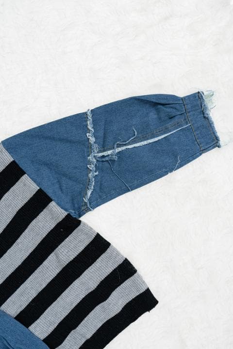 Foto model menggunakan produk Audrey Denim Knit Sweater
