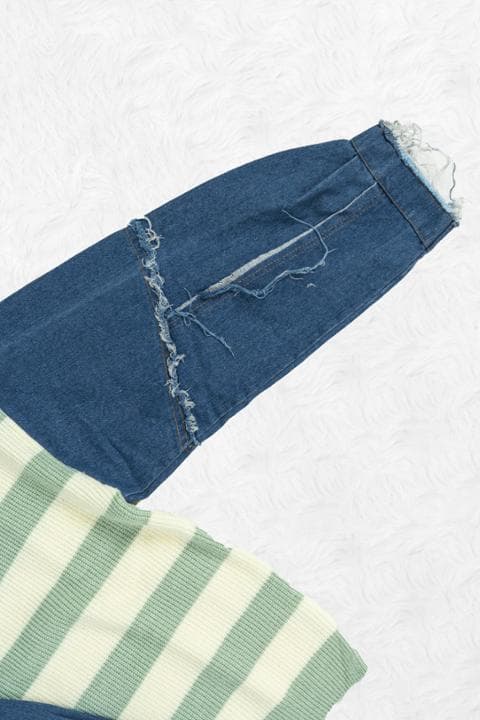 Foto model menggunakan produk Audrey Denim Knit Sweater