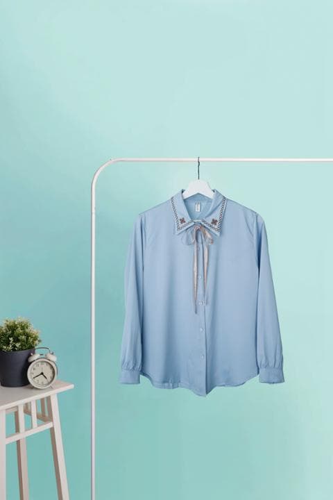 Foto model menggunakan produk Windy Sweet Ribbon Blouse