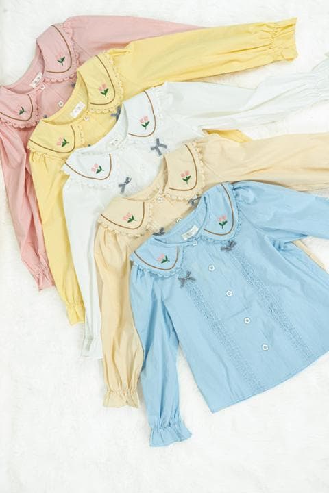Foto model menggunakan produk Edith Cute Ribbon Blouse