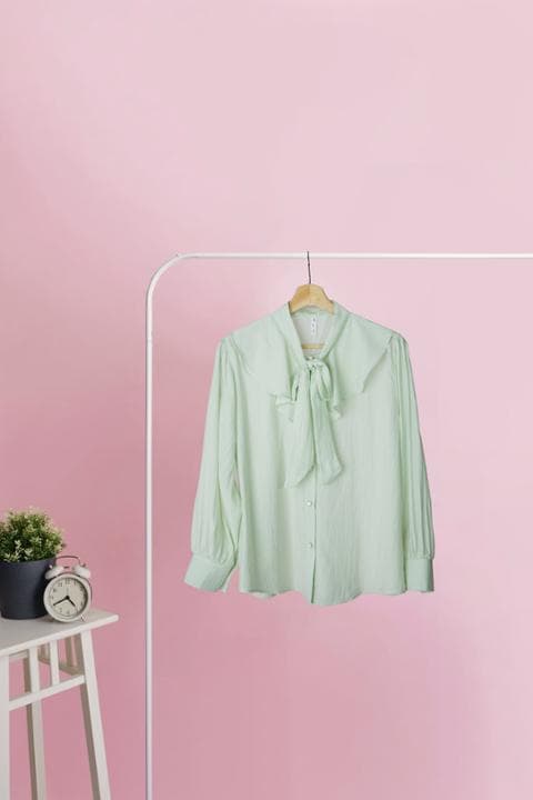 Foto model menggunakan produk Danish Ruffle Elegant Blouse